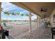 Relaxing community pool with lounge chairs and tables to enjoy Florida's sunshine and a luxurious, resort-like feel at 3520 Kenneth Rd, Port Charlotte, FL 33953