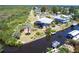 Aerial view showcasing home and private boat dock on a calm canal at 3712 Balboa Ct, Punta Gorda, FL 33983