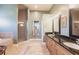 Bright bathroom features double sinks, a soaking tub, and a glass-enclosed shower at 3712 Balboa Ct, Punta Gorda, FL 33983