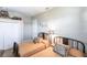 Comfortable bedroom featuring two twin beds, soft lighting, and ample closet space at 3712 Balboa Ct, Punta Gorda, FL 33983