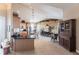 Open-concept living space with a kitchen bar and hardwood floors at 3712 Balboa Ct, Punta Gorda, FL 33983