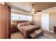 Comfortable main bedroom features a large window and a decorative ceiling at 3712 Balboa Ct, Punta Gorda, FL 33983
