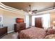 Spacious main bedroom showcases a TV and large dresser for ample storage at 3712 Balboa Ct, Punta Gorda, FL 33983