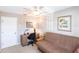 Bedroom is furnished with a futon, desk, and a ceiling fan, and is perfect for a home office at 4000 Bal Harbor Blvd # 124, Punta Gorda, FL 33950
