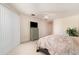 Cozy bedroom features neutral carpet and ceiling fan for comfortable living at 4010 Yucatan Cir, Port Charlotte, FL 33948