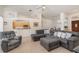 Inviting living room features tile floors, neutral walls, and a comfortable sectional sofa at 4010 Yucatan Cir, Port Charlotte, FL 33948