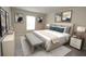 Inviting main bedroom with stylish decor, large bed, and a bright window showcasing natural light at 4071 Conestoga St, Port Charlotte, FL 33948