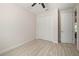 Neutral bedroom featuring tiled floors, a ceiling fan, and a closet at 4174 Perch Cir, Port Charlotte, FL 33948