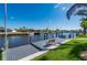 This waterfront backyard features a private dock, perfect for boaters looking to enjoy the canal at 4174 Perch Cir, Port Charlotte, FL 33948
