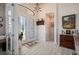 Warm foyer with decorative glass double doors and accents at 4174 Perch Cir, Port Charlotte, FL 33948