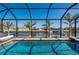Screened in pool overlooking waterfront provides an open and airy experience at 4174 Perch Cir, Port Charlotte, FL 33948