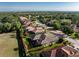 Aerial view of this single-story home with a private backyard and a screened-in lanai at 4676 Tuscana Dr, Sarasota, FL 34241