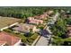 Aerial view of the home showing its lush landscaping and well-maintained exterior at 4676 Tuscana Dr, Sarasota, FL 34241