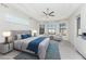 Bright bedroom with large windows, soft natural light, and cozy decor at 4676 Tuscana Dr, Sarasota, FL 34241