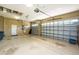 Spacious three-car garage providing ample room for vehicles and storage at 4676 Tuscana Dr, Sarasota, FL 34241