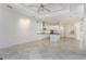 Bright living area with kitchen, tile flooring and plenty of space for entertaining at 4676 Tuscana Dr, Sarasota, FL 34241