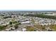 Aerial view of the community amenities with pool, parking, and well-manicured landscaping at 5488 Holiday Park Blvd, North Port, FL 34287