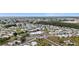 Aerial view of the community amenities with pool, parking, and well-manicured landscaping at 5488 Holiday Park Blvd, North Port, FL 34287