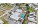 Aerial view of Shuffleboard Courts and Community Building with ample parking at 5488 Holiday Park Blvd, North Port, FL 34287