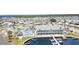 Aerial view of the active adult community featuring a pool, marina, and clubhouse at 714 Fairmount Dr, North Port, FL 34287
