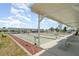 Outdoor covered bocce ball court offers ample seating and entertainment space for residents at 714 Fairmount Dr, North Port, FL 34287