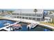 Waterfront community building with boat docks, offering beautiful views and convenient access to boating at 714 Fairmount Dr, North Port, FL 34287