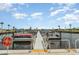 Picturesque waterfront view of a community dock with multiple boat slips and easy access to the water at 714 Fairmount Dr, North Port, FL 34287