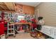 Organized garage features workbench and tool storage at 714 Fairmount Dr, North Port, FL 34287