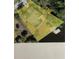 Aerial view showing property lines, landscaping, and surrounding neighborhood at 719 Ellicott Nw Cir, Port Charlotte, FL 33952