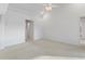 Neutral bedroom featuring plush carpeting and spacious layout at 719 Ellicott Nw Cir, Port Charlotte, FL 33952