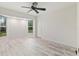 Well-lit bedroom with plenty of natural light and plank flooring at 719 Ellicott Nw Cir, Port Charlotte, FL 33952