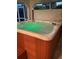 Inviting hot tub with soothing green lights for a relaxing experience at 719 Ellicott Nw Cir, Port Charlotte, FL 33952