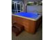 Inviting hot tub with steps and soothing blue lights for a relaxing experience at 719 Ellicott Nw Cir, Port Charlotte, FL 33952