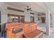 Relaxing covered patio featuring a hot tub with views of the water, perfect for enjoying evenings at 719 Ellicott Nw Cir, Port Charlotte, FL 33952