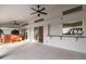 Patio featuring jacuzzi, tile flooring, and pass through window at 719 Ellicott Nw Cir, Port Charlotte, FL 33952