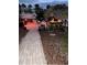 Waterfront property featuring a tiki bar for entertaining, complete with seating and scenic views at 719 Ellicott Nw Cir, Port Charlotte, FL 33952