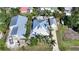 Stunning aerial view showcasing the property's layout, lush landscaping, and proximity to nearby amenities at 740 W Virginia Ave, Punta Gorda, FL 33950