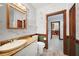 Bathroom with wooden trim and walls with signatures at 740 W Virginia Ave, Punta Gorda, FL 33950