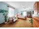 Spacious bedroom featuring natural wood furniture, a ceiling fan, and light blue walls at 740 W Virginia Ave, Punta Gorda, FL 33950