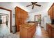 Spacious kitchen with stainless steel appliances, ample cabinet space, a center island, and an open layout at 740 W Virginia Ave, Punta Gorda, FL 33950