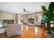 Bright living room featuring hardwood floors, a fireplace, and recessed lighting at 740 W Virginia Ave, Punta Gorda, FL 33950