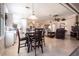 Open floorplan featuring eat-in kitchen flowing seamlessly into the spacious living room at 10227 Windsong Rd, Punta Gorda, FL 33955