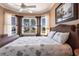 Bedroom featuring a bay window and a wicker bed frame at 10227 Windsong Rd, Punta Gorda, FL 33955