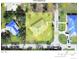 Aerial view of the property, showing the house, pool and land plot at 1233 Dewhurst St, Port Charlotte, FL 33952