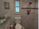 Updated bathroom with modern fixtures and stylish design at 1233 Dewhurst St, Port Charlotte, FL 33952