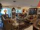 Beautiful living room with ornate furniture, tile floors, and many decorative items at 1233 Dewhurst St, Port Charlotte, FL 33952