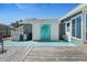 Backyard with outdoor access, pool equipment, and painted palm tree decoration at 1249 Indus, Venice, FL 34293