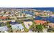 Scenic aerial view of waterfront homes on the canals with quick access to the bay and ocean in this coastal neighborhood at 125 Donna Ct, Punta Gorda, FL 33950