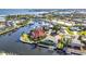 Overhead perspective featuring homes on canals that offer access to bay, with amenities like private pools and boat docks at 125 Donna Ct, Punta Gorda, FL 33950
