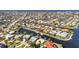 Expansive aerial view of waterfront homes with canals, docks, and lush landscaping in a coastal community at 125 Donna Ct, Punta Gorda, FL 33950